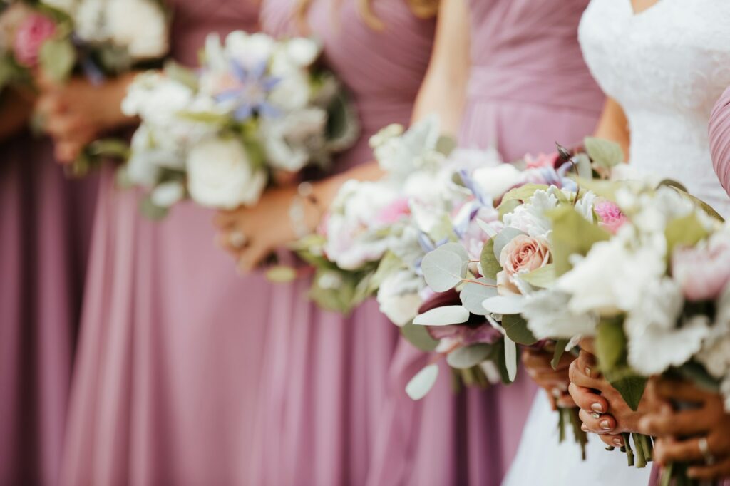 pink bridesmaids with bouquets